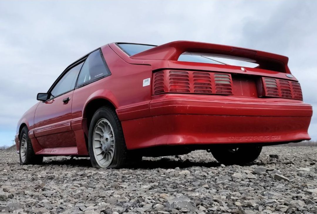Strolling-the-U-Pull-It-1988-Foxbody-Mustang